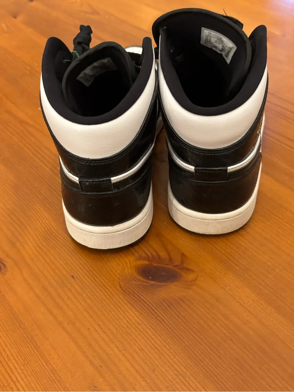 Jordan Men’s High-Top Sneakers in Black and White (size: 11)